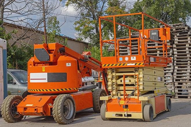 forklift operator organizing inventory in warehouse in Leawood, KS